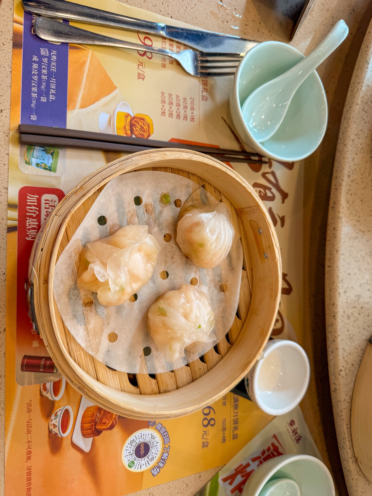 Fresh dumplings served in a bamboo steamer