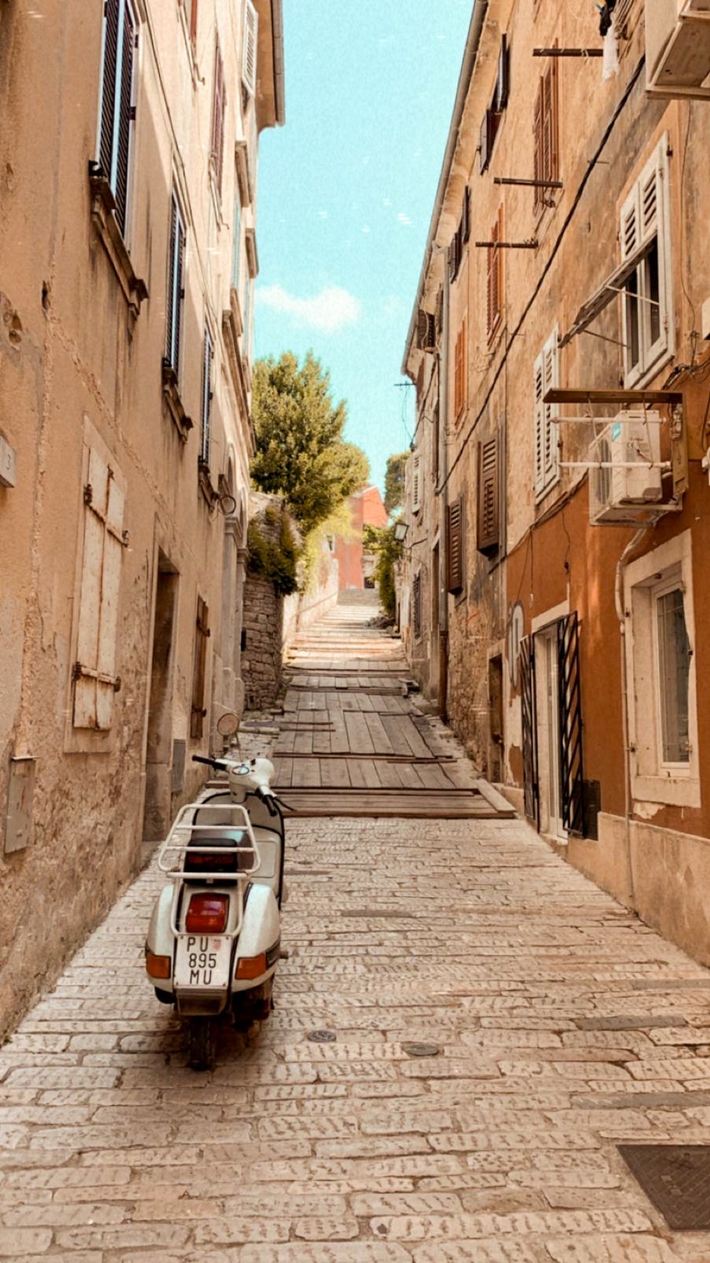 a scooter waiting uphill