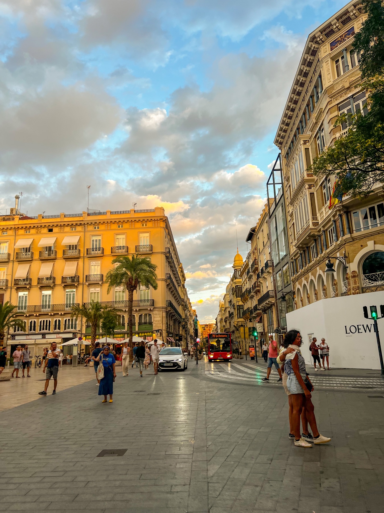 A broad Valencia boulevard in warm evening light