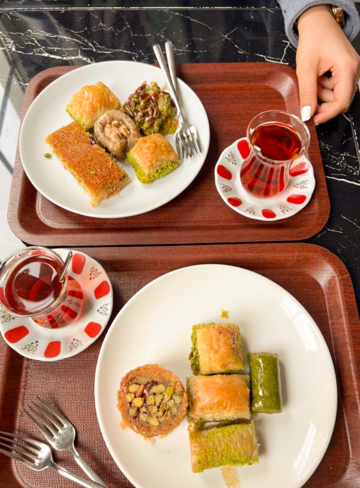 Plates of baklava served with Turkish tea